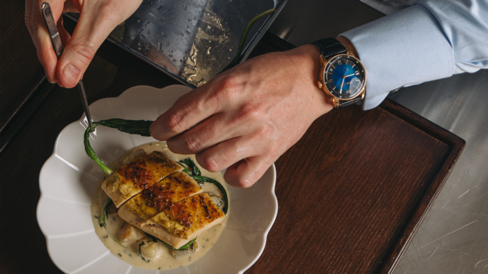 Chef Tristin Farmer plating with precision