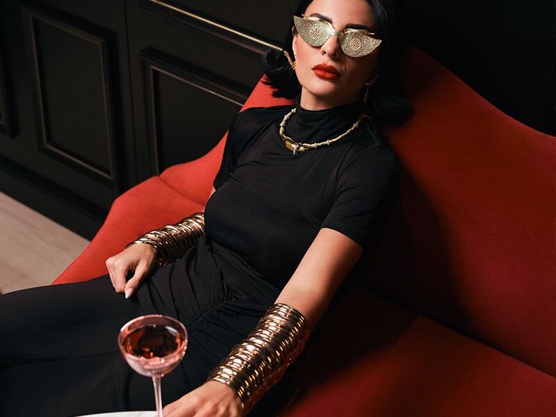 Luxurious Red Book Club interior with elegant seating and wine service